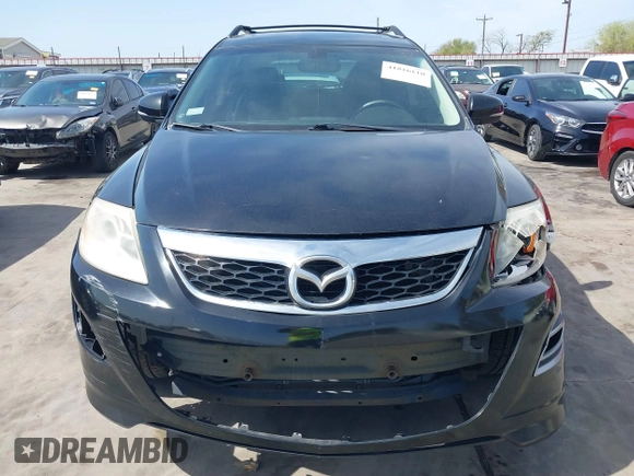 2011 Mazda CX-9 Grand Touring with VIN JM3TB3DA5B0300784, listed as a IAAI auction lot 41816110 with 138,523 mi miles and . Bid and sale history available at DreamBid. Image 13.