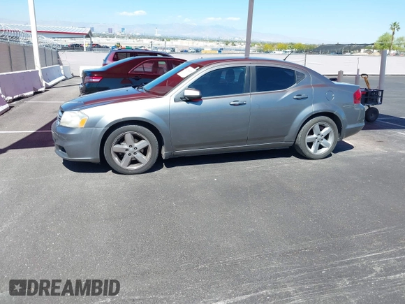 2013 Dodge Avenger SXT with VIN 1C3CDZCG3DN655815, listed as a IAAI auction lot 42190457 with 161,890 mi miles and . Bid and sale history available at carsss.com. Image 12.