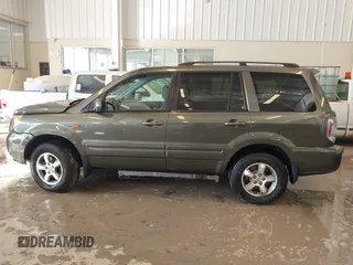 2006 Honda Pilot EX-L with VIN 5FNYF187X6B026463, listed as a IAAI auction lot 41612181 with 242,828 mi miles and . Bid and sale history available at DreamBid. Image 14.