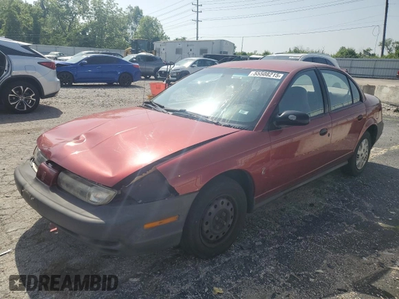 1999 Saturn SL z VIN 1G8ZH5288XZ273509, wystawiony jako Copart lot #55508215 z przebiegiem 168 946 mil mil oraz Szkoda całkowita • Salvage title. Historia ofert i sprzedaży dostępna na DreamBid. Obrazek 1.