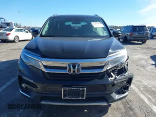 2022 Honda Pilot Touring 7-Passenger with VIN 5FNYF6H63NB006591, listed as a IAAI auction lot 41471359 with 75,574 mi miles. Bid and sale history available at carsss.com. Image 12.