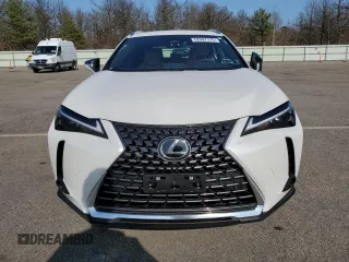 2025 Lexus UX with VIN JTHUCJDH6S2007491, listed as a Copart auction lot 52997175 with 1,042 mi miles and Salvage Title. Bid and sale history available at carsss.com. Image 5.