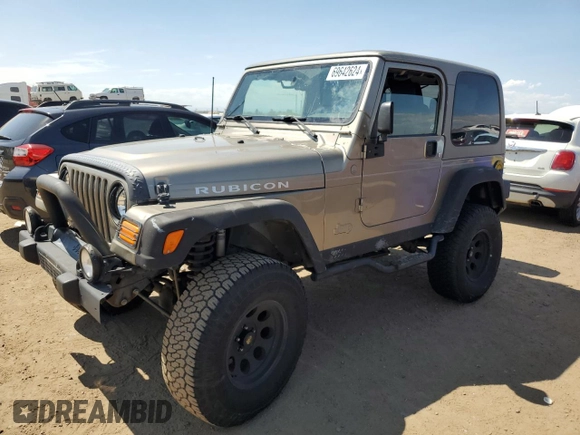 2004 Jeep Wrangler Rubicon with VIN 1J4FA69S64P751349, listed as a Copart auction lot 69642624 with 160,589 mi miles and Salvage Title. Bid and sale history available at carsss.com. Image 1.