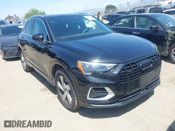 2019 Audi Q3 Premium with VIN WA1AECF33K1086047, listed as a IAAI auction lot 41905218 with 51,802 mi miles. Bid and sale history available at carsss.com. Image 1.