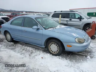 1997 Mercury Sable GS with VIN 1MELM50U3VG655266, listed as a IAAI auction lot 41612223 with 86,993 mi miles. Bid and sale history available at carsss.com. Image 1.