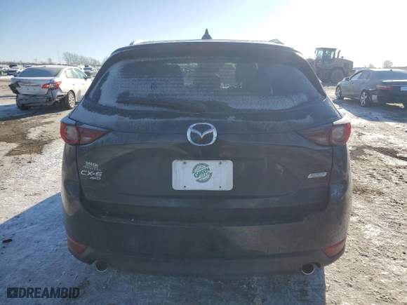 2019 Mazda CX-5 Touring with VIN JM3KFBCM6K0572041, listed as a Copart auction lot 46377455 with NaN miles and Salvage Title. Bid and sale history available at carsss.com. Image 6.