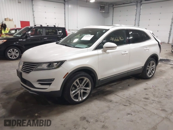 2016 Lincoln MKC Reserve with VIN 5LMTJ3DH2GUJ24052, listed as a IAAI auction lot 41666912 with 62,818 mi miles and . Bid and sale history available at DreamBid. Image 2.