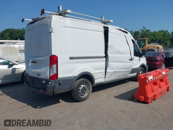 2015 Ford Transit Cargo z VIN 1FTNR2CM8FKA48994, wystawiony jako IAAI lot #42530112 z przebiegiem 207 506 mil mil oraz . Historia ofert i sprzedaży dostępna na DreamBid. Obrazek 4.