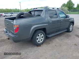 2007 Honda Ridgeline RTL z VIN 2HJYK16517H511157, wystawiony jako IAAI lot #42257637 z przebiegiem 266 894 mil mil oraz . Historia ofert i sprzedaży dostępna na DreamBid. Obrazek 4.