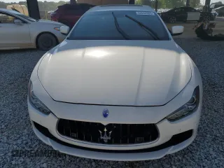 2014 Maserati Ghibli z VIN ZAM57XSA5E1081980, wystawiony jako Copart lot #53546905 z przebiegiem 60 019 mil mil oraz Tytuł czysty. Historia ofert i sprzedaży dostępna na DreamBid. Obrazek 5.