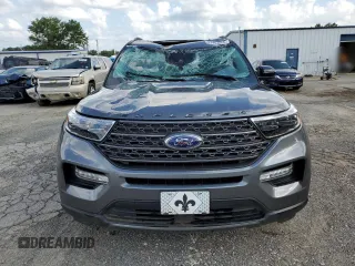 2023 Ford Explorer XLT with VIN 1FMSK7DH1PGC12480, listed as a Copart auction lot 61403655 with 20,555 mi miles and Salvage title. Bid and sale history available at DreamBid. Image 5.