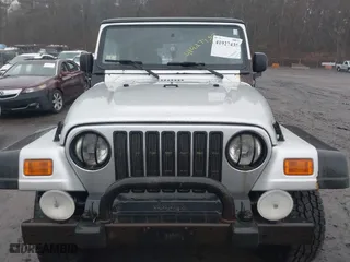 2006 Jeep Wrangler X with VIN 1J4FA39SX6P709588, listed as a IAAI auction lot 41927435 with 227,990 mi miles. Bid and sale history available at carsss.com. Image 6.