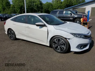 2016 Honda Civic EX-T with VIN 19XFC1F39GE025313, listed as a Copart auction lot 59542395 with 60,624 mi miles and Clean title. Bid and sale history available at DreamBid. Image 4.