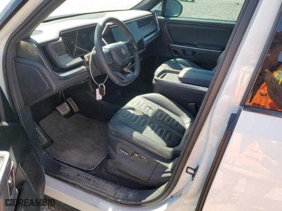 2023 Rivian R1S Launch Edition with VIN 7PDSGABLXPN004161, listed as a Copart auction lot 67390954 with 0 mi miles and Salvage Title. Bid and sale history available at carsss.com. Image 7.