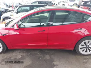 2022 Tesla Model 3 with VIN 5YJ3E1EA8NF177409, listed as a IAAI auction lot 41740718 with 25,557 mi miles. Bid and sale history available at carsss.com. Image 14.