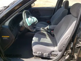 2005 Hyundai Elantra GLS z VIN KMHDN46D75U115887, wystawiony jako Copart lot #54938955 z przebiegiem 101 490 mil mil oraz Szkoda całkowita • Salvage title. Historia ofert i sprzedaży dostępna na DreamBid. Obrazek 7.