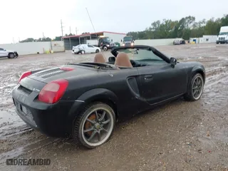 2001 Toyota MR2 Spyder with VIN JTDFR320610038610, listed as a IAAI auction lot 40795637 with 70,516 mi miles. Bid and sale history available at carsss.com. Image 4.