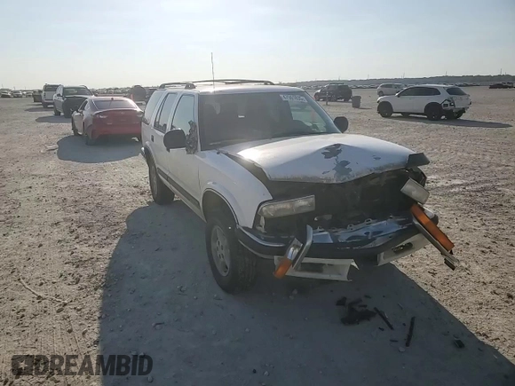 1998 Chevrolet Blazer LS z VIN 1GNDT13W9W2147761, wystawiony jako Copart lot #47551835 z przebiegiem 211 761 mil mil oraz Szkoda całkowita • Salvage title. Historia ofert i sprzedaży dostępna na DreamBid. Obrazek 12.