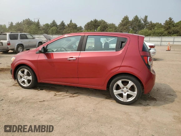 2012 Chevrolet Sonic LTZ with VIN 1G1JE6SH7C4111176, listed as a Copart auction lot 59002575 with 116,640 mi miles and Salvage title. Bid and sale history available at DreamBid. Image 2.