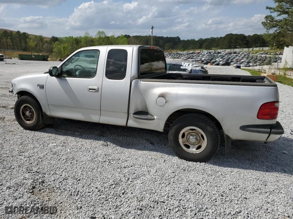 2003 Ford F-150 XL with VIN 1FTRX07W23KC51964, listed as a Copart auction lot 51669715 with 0 mi miles and Salvage Title. Bid and sale history available at carsss.com. Image 2.
