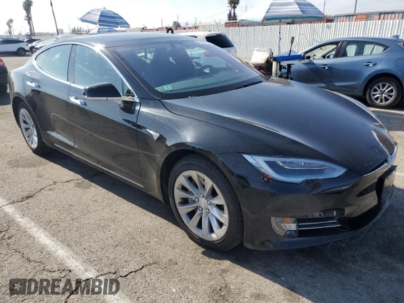 2018 Tesla Model S 75D с VIN 5YJSA1E29JF291834, выставлен на аукционе Copart как лот 55353725 с пробегом 26 871 миль миль и Списание • Salvage title. История ставок и продаж доступна на DreamBid. Изображение 4.