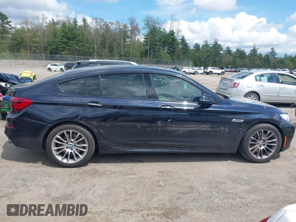 2014 BMW 5 Series 535i Gran Turismo xDrive with VIN WBA5M4C52ED183844, listed as a IAAI auction lot 42227214 with 104,098 mi miles and . Bid and sale history available at DreamBid. Image 14.