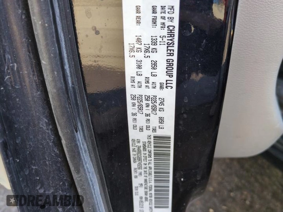 2011 Chrysler Town & Country Limited z VIN 2A4RR6DG8BR749266, wystawiony jako Copart lot #52408075 z przebiegiem 249 634 mil mil oraz Szkoda całkowita • Salvage title. Historia ofert i sprzedaży dostępna na DreamBid. Obrazek 13.