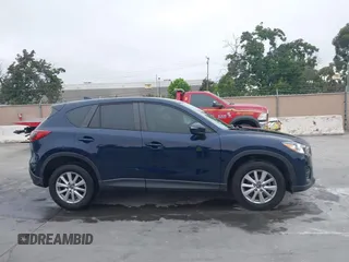 2016 Mazda CX-5 Sport с VIN JM3KE2BY2G0856071, выставлен на аукционе IAAI как лот 42473128 с пробегом 57 250 миль миль и . История ставок и продаж доступна на DreamBid. Изображение 13.