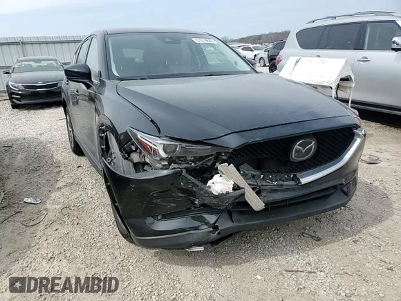 2021 Mazda CX-5 Grand Touring with VIN JM3KFBDM6M0401517, listed as a Copart auction lot 51019645 with 55,906 mi miles and Salvage Title. Bid and sale history available at DreamBid. Image 11.