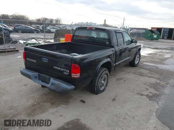 2004 Dodge Dakota Sport with VIN 1D7HL38N24S768283, listed as a IAAI auction lot 41635910 with 328,505 mi miles. Bid and sale history available at carsss.com. Image 4.