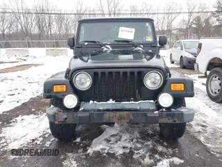 2005 Jeep Wrangler X with VIN 1J4FA39S55P353131, listed as a IAAI auction lot 41575949 with 154,026 mi miles and . Bid and sale history available at DreamBid. Image 6.