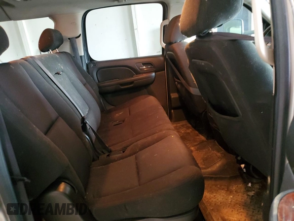 2010 GMC Yukon XL z VIN 1GKUKHE34AR126165, wystawiony jako Copart lot #52317135 z przebiegiem 234 675 mil mil oraz Tytuł czysty. Historia ofert i sprzedaży dostępna na DreamBid. Obrazek 11.