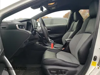 2019 Toyota Corolla Hatchback SE with VIN JTNK4RBEXK3051691, listed as a Copart auction lot 77159164 with 21,051 mi miles and Salvage Title. Bid and sale history available at carsss.com. Image 7.