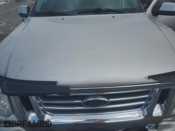 2007 Ford Explorer Sport Trac Limited z VIN 1FMEU53887UA32895, wystawiony jako Copart lot #54661435 z przebiegiem 195 022 mil mil oraz Szkoda całkowita • Salvage title. Historia ofert i sprzedaży dostępna na DreamBid. Obrazek 11.