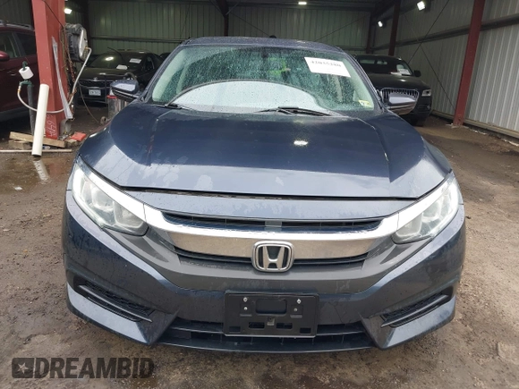 2016 Honda Civic Sedan LX with VIN 19XFC2F58GE009207, listed as a IAAI auction lot 42035280 with 76,052 mi miles. Bid and sale history available at carsss.com. Image 12.