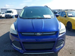 2014 Ford Escape SE with VIN 1FMCU9GX1EUB52373, listed as a IAAI auction lot 42163933 with 128,634 mi miles. Bid and sale history available at carsss.com. Image 6.