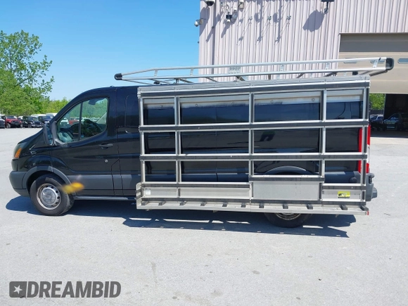 2015 Ford Transit Cargo z VIN 1FTBW2YG7FKA20201, wystawiony jako IAAI lot #42253463 z przebiegiem 83 235 mil mil oraz . Historia ofert i sprzedaży dostępna na DreamBid. Obrazek 14.