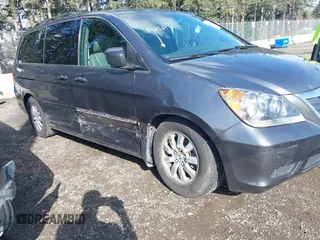 2010 Honda Odyssey EX-L with VIN 5FNRL3H67AB087262, listed as a IAAI auction lot 41999995 with 153,186 mi miles. Bid and sale history available at carsss.com. Image 6.