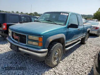 1997 GMC Sierra 2500 z VIN 1GTGK29JXVE562949, wystawiony jako Copart lot #68270174 z przebiegiem 212 422 mil mil oraz Szkody całkowita. Historia ofert i sprzedaży dostępna na DreamBid. Obrazek 1.