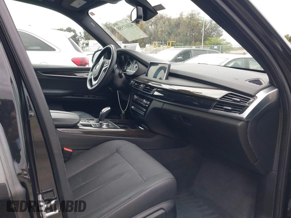 2018 BMW X5 xDrive35i with VIN 5UXKR0C55JL073210, listed as a IAAI auction lot 42047558 with 37,497 mi miles. Bid and sale history available at carsss.com. Image 5.