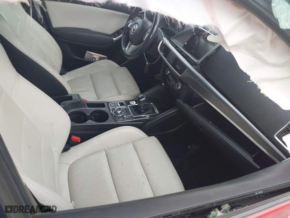 2016 Mazda CX-5 Grand Touring with VIN JM3KE4DYXG0641174, listed as a IAAI auction lot 41182655 with NaN miles. Bid and sale history available at carsss.com. Image 5.