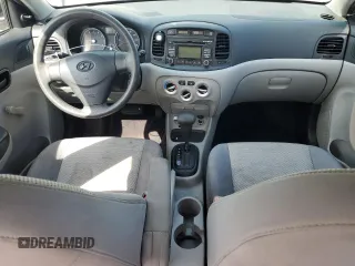 2011 Hyundai Accent GLS z VIN KMHCN4AC9BU602370, wystawiony jako Copart lot #58574905 z przebiegiem 184 916 mil mil oraz Szkoda całkowita • Salvage title. Historia ofert i sprzedaży dostępna na DreamBid. Obrazek 8.