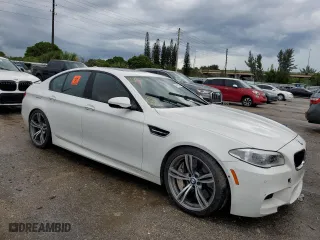 2016 BMW M5 with VIN WBSFV9C52GG343300, listed as a Copart auction lot 49419563 with 39,217 mi miles. Bid and sale history available at carsss.com. Image 4.
