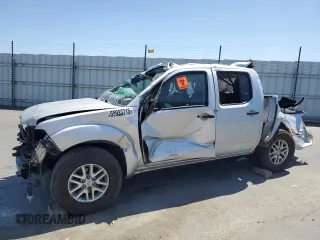 2014 Nissan Frontier S with VIN 1N6AD0ER4EN746796, listed as a Copart auction lot 55933715 with 106,553 mi miles and Salvage title. Bid and sale history available at DreamBid. Image 1.