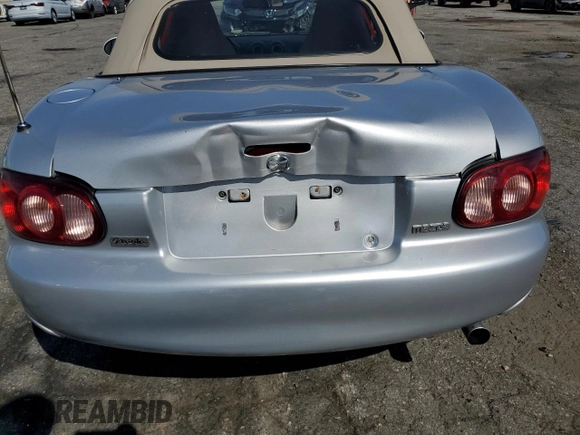 2003 Mazda MX-5 Miata Cloth z VIN JM1NB353430301685, wystawiony jako Copart lot #48756715 z przebiegiem 57 414 mil mil oraz Szkoda całkowita • Salvage title. Historia ofert i sprzedaży dostępna na DreamBid. Obrazek 11.
