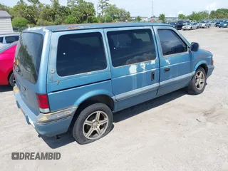 1994 Dodge Caravan z VIN 2B4GH25K4RR517492, wystawiony jako IAAI lot #41940051 z przebiegiem 241 574 mil mil oraz . Historia ofert i sprzedaży dostępna na DreamBid. Obrazek 4.