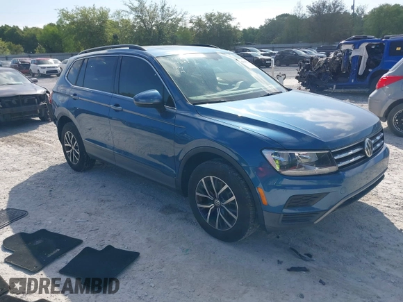 2019 Volkswagen Tiguan SE with VIN 3VV3B7AX2KM006055, listed as a IAAI auction lot 42023713 with 83,570 mi miles and . Bid and sale history available at DreamBid. Image 1.