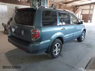 2007 Honda Pilot EX-L with VIN 5FNYF28647B004098, listed as a IAAI auction lot 41404472 with 319,747 mi miles. Bid and sale history available at carsss.com. Image 4.