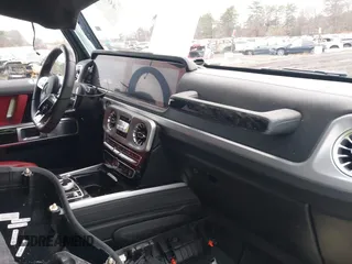 2023 Mercedes-Benz G with VIN W1NYC7HJ9PX480095, listed as a IAAI auction lot 40912493 with 5,055 mi miles. Bid and sale history available at carsss.com. Image 5.