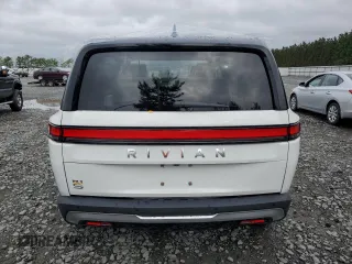 2023 Rivian R1S Adventure z VIN 7PDSGABA6PN017889, wystawiony jako Copart lot #68860864 z przebiegiem 7661 mil mil oraz Szkody całkowita. Historia ofert i sprzedaży dostępna na DreamBid. Obrazek 6.